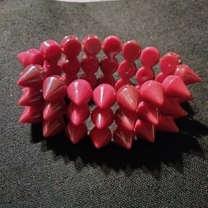 Triple spiked stud stretch bracket